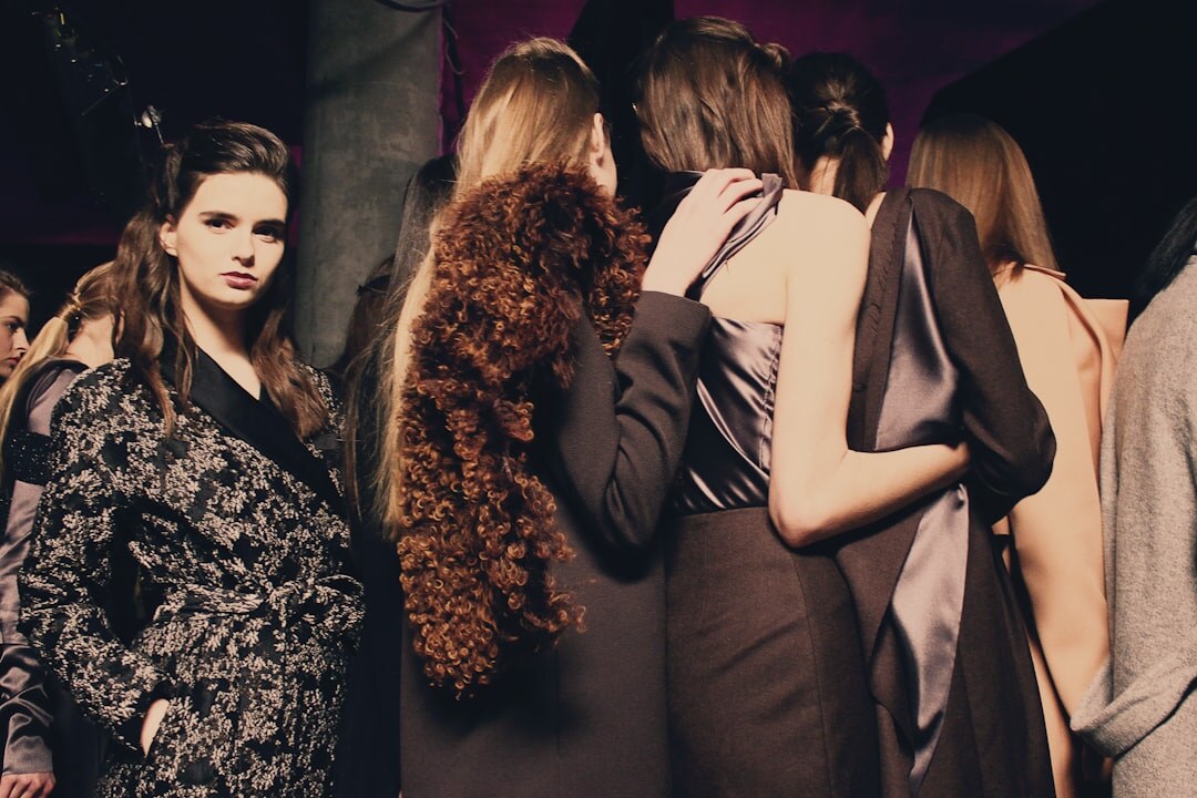 Fashion event backstage with models and designers