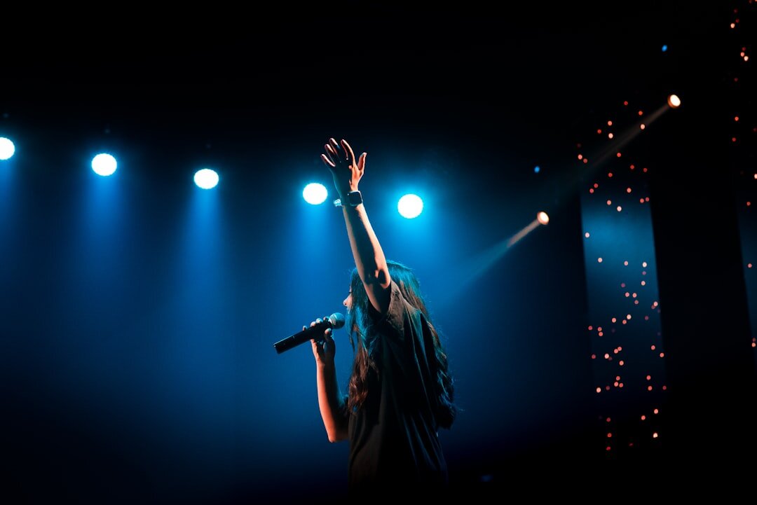 singer rehearsing on stage