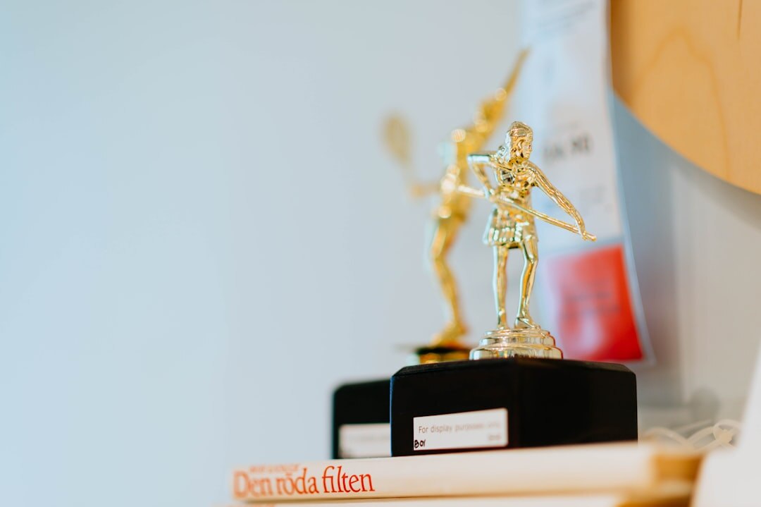 Award ceremony stage with golden trophies